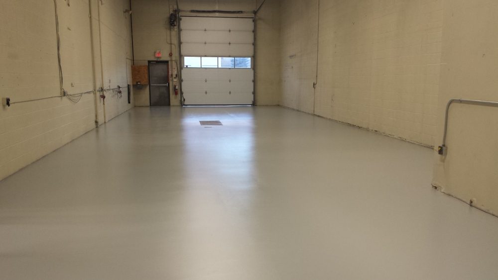 Floor stripped and ground back to bare concrete